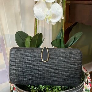 Vintage black woven Banana Republic Clutch that has never been used
